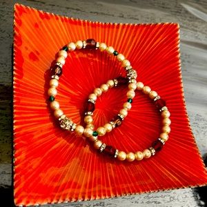 Set of 2 beaded fashion bracelets with faux pearls and crystals. NWOT.